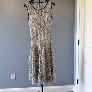 Sleeveless Black & White Printed Ruffle-Hem Midi Dress
